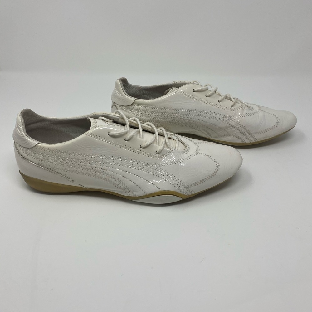 Puma white patent leather lace up shoes